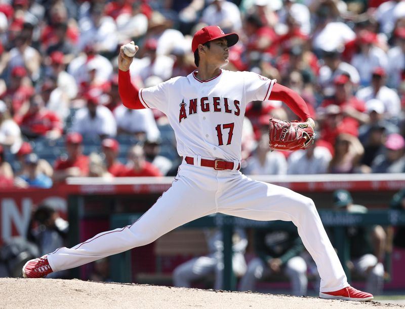 美國職棒MLB日籍巨星大谷翔平8日先發,投7局只被敲一支安打,送出12次三振,助洛杉磯天使以6比1擊敗奧克蘭運動家。(共同社提供)