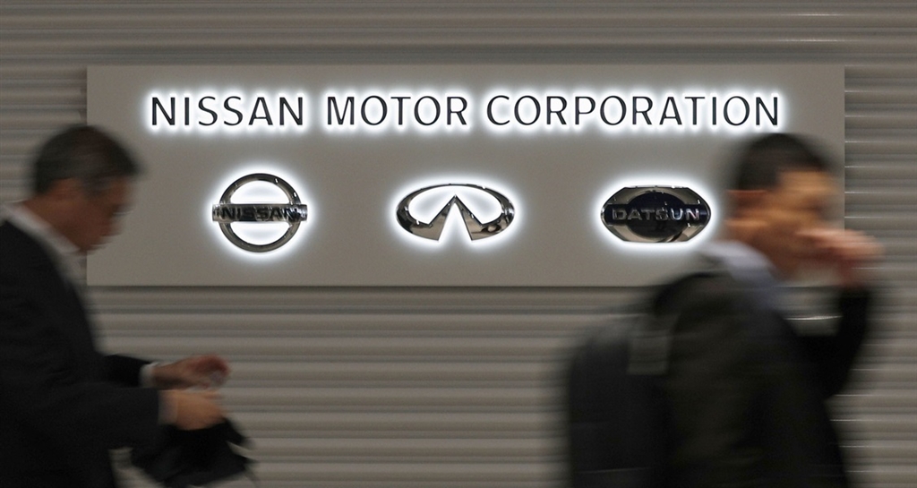 日產汽車董事長戈恩與代表董事凱利因涉嫌少申報薪資,有逃漏稅之嫌;依法如適用兩罰規定,日產汽車可能被課以最高7億日圓罰金。圖為日產汽車東京總部。(共同社提供)