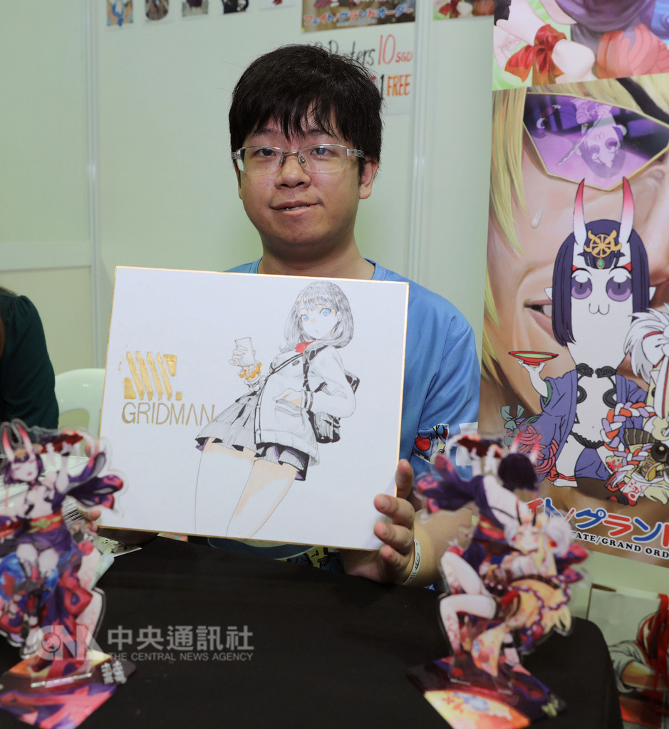 新加坡亞洲動漫展30日登場,圖為筆名為B.c.N.y.的台灣同人畫師游翰元繪製的SSSS.GRIDMAN的寶多六花。中央社記者黃自強新加坡攝 107年11月30日