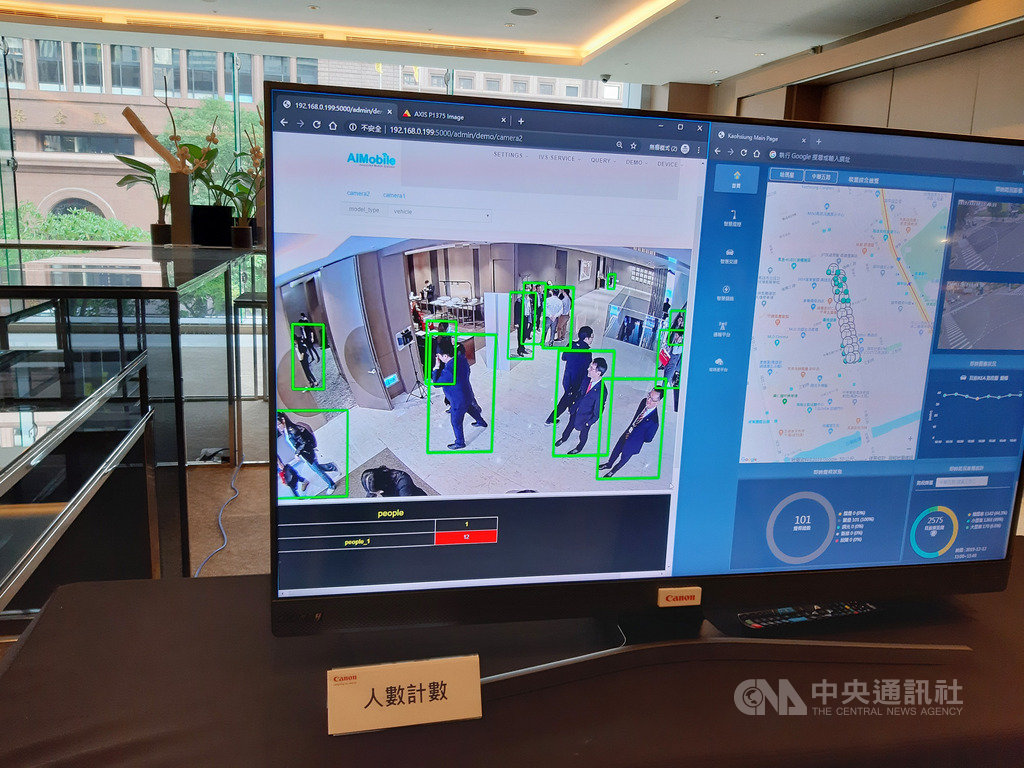 英業達旗下英研智能移動(AIMobile)12日與台灣佳能(Canon)宣布,攜手打造智慧交通城市,並展示產品。中央社記者潘智義攝 108年12月12日