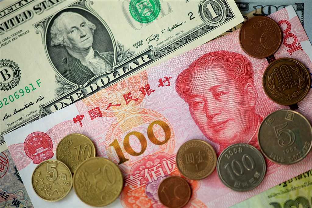 美中13日宣布達成第一階段貿易協議,預定2020年1月初簽署協議,內容包括美國撤銷部分加徵關稅、中方加碼採購美國農業,也初步觸及智財保障等議題。(示意圖/中新社提供)