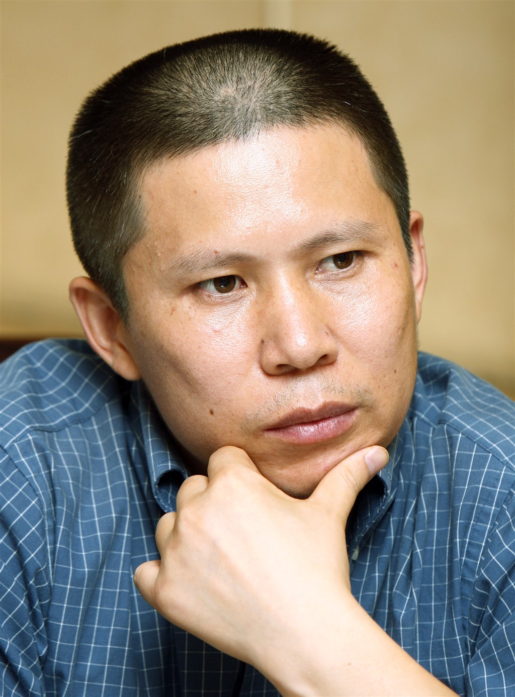 中國公民運動倡議者、日前因呼籲中國國家主席習近平讓位而遭追查的法學博士許志永(圖),據稱已於15日晚間在廣州被拘捕。(檔案照片/美聯社)