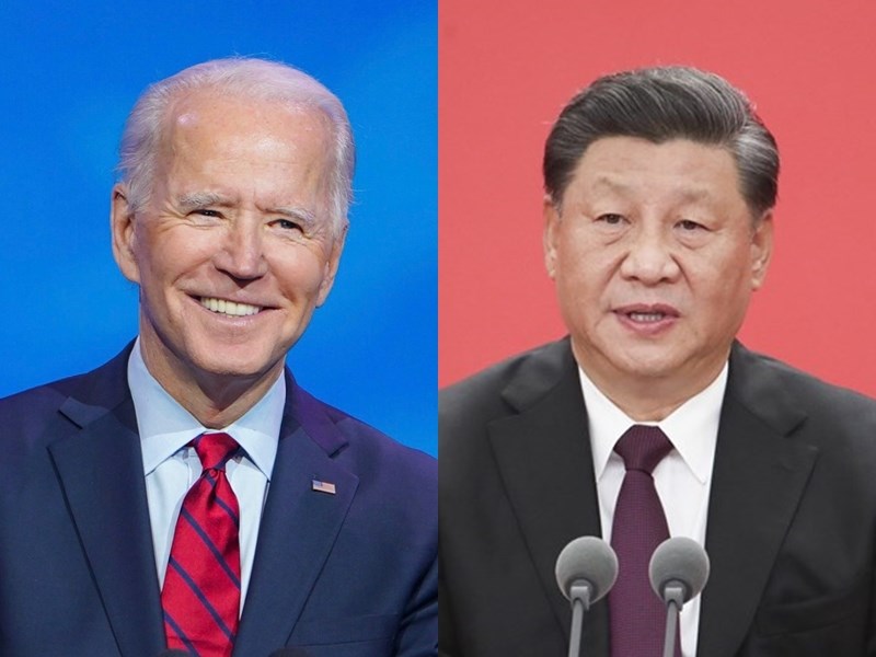 中國外交部長王毅22日說,中美兩國元首春節前的通話,為處於十字路口的兩國關係指明方向。左為美國總統拜登,右為中共領導人習近平。(左圖取自facebook.com/POTUS,右圖為中新社)