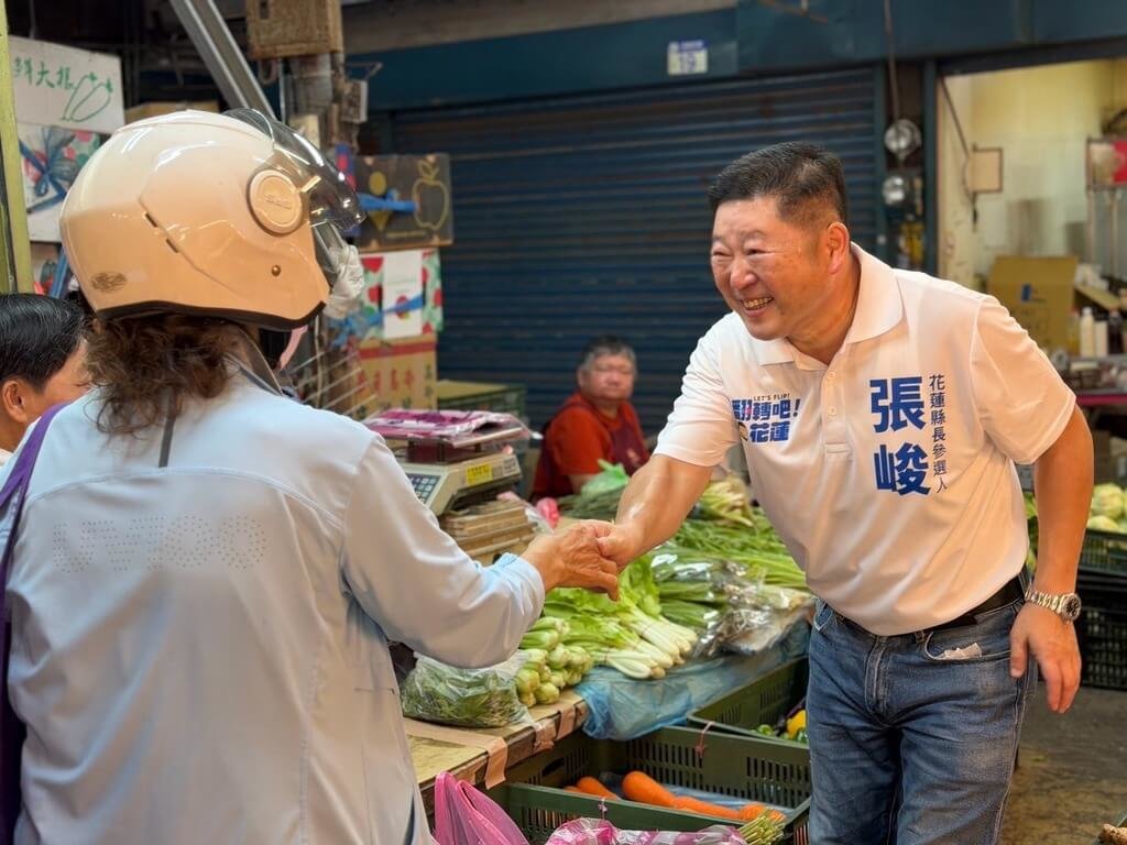 張峻積極走訪市場拜票