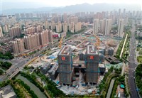 美媒：中國擬擴大控制房市 收購財困建案再租售
