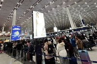 台商返台投票先冷後熱  北京返台班機載客逾9成