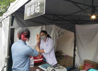 立法院續審國會職權修法  民團冒雨集結自組醫療站