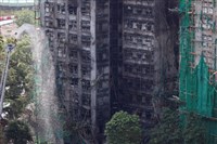 宏福苑火災大樓被棚網包圍　港府指去年巡查16次、曾提醒防火