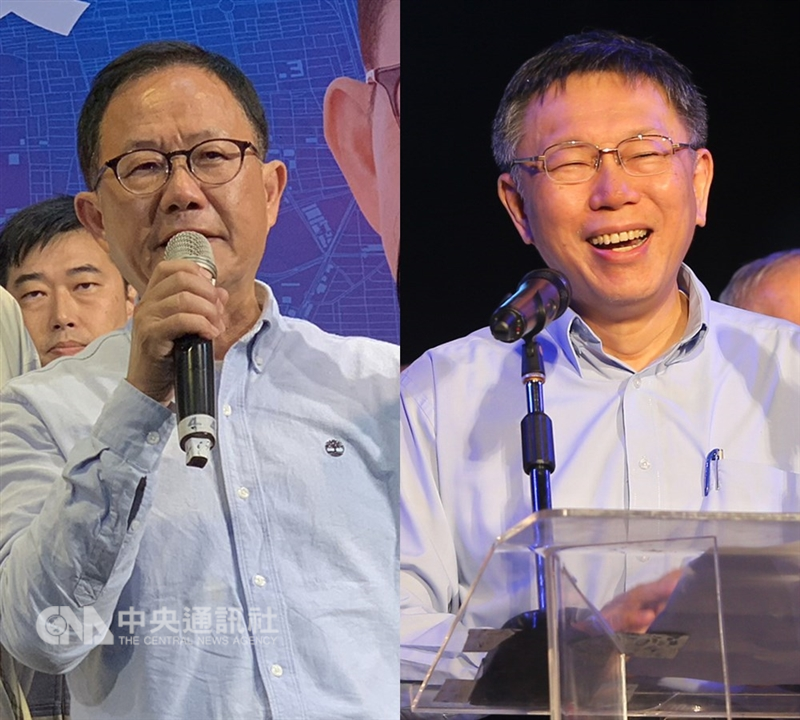 台北市選舉委員會25日以書面方式,說明台北市長選舉結果很晚才揭曉原因。圖為國民黨籍市長候選人丁守中(左)與台北市長柯文哲(右)。(中央社檔案照片)
