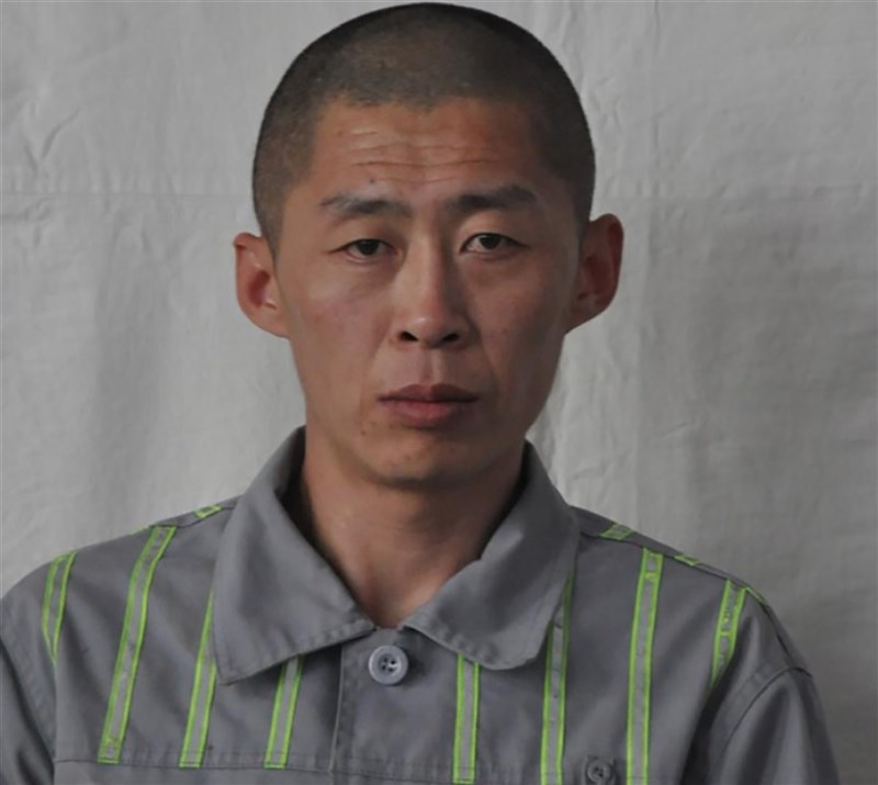 逃亡逾40天的北韓籍囚犯朱賢健（圖）28日落網。（圖取自吉林監獄懸賞通告）