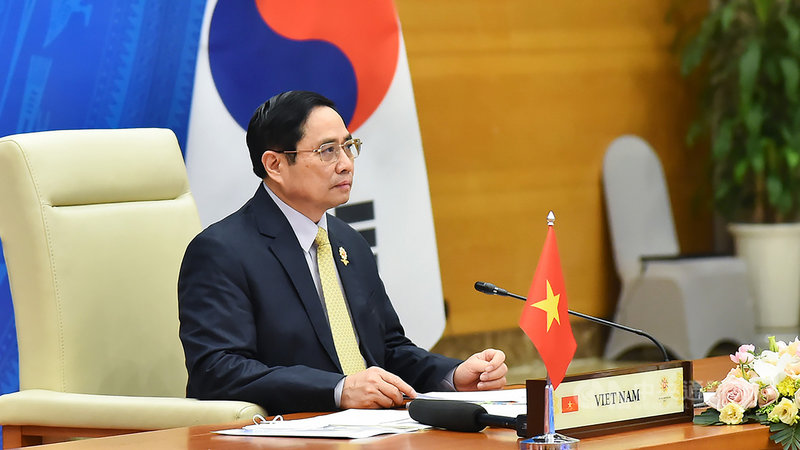 越南總理范明正26日在ASEAN峰會上表示,越南政府已批准疫苗護照使用標準,願與東協各國交換COVID-19疫苗接種證書,包括「數位化證書」的形式。(越南外交部提供)中央社記者陳家倫河內傳真 110年10月26日