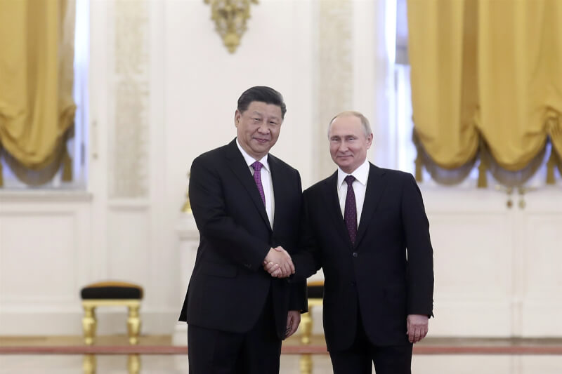 圖為2019年中國國家主席習近平（左起）與蒲亭在莫斯科會談。（中新社）