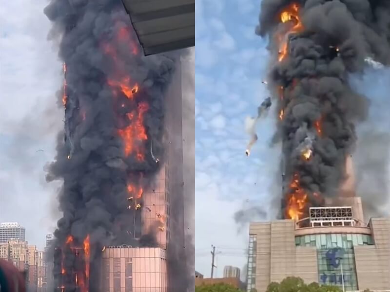 長沙中國電信大樓16日下午失火，從中國網直播微博的影片可看到濃煙直衝天際。（圖取自中國網直播微博weibo.com）