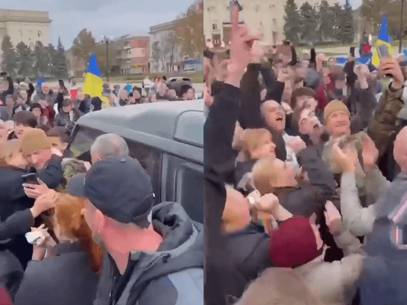 烏克蘭軍人11日抵達赫松市中心，居民歡騰迎接有人忍不住擁抱獻吻，烏軍戰士也高興拿出手機自拍記錄這寶貴一刻。（圖取自twitter.com/KyivIndependent）