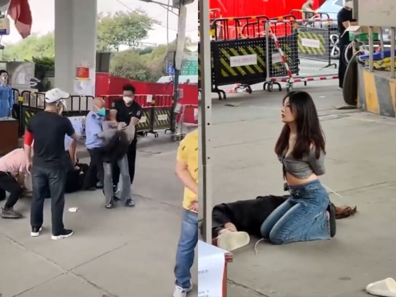 根據推特流傳的畫面，廣州2名女子被多名男子抓住摔倒，並反綁手腳。（圖取自twitter.com）