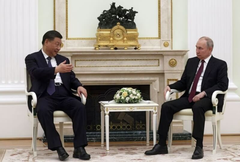 俄羅斯總統蒲亭（右）3月在莫斯科與中國國家主席習近平（左）會談。（Sputnik/Sergei Karpukhin/Pool via 路透社）