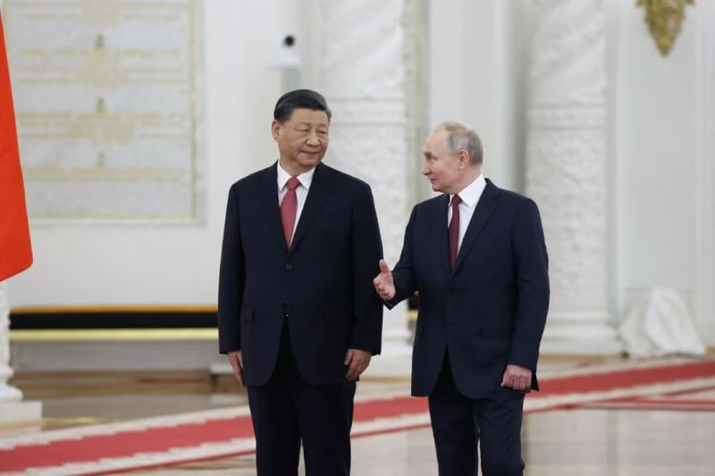 圖為3月中國領導人習近平（左）與俄國總統蒲亭（右）會談。（Sputnik/Sergei Karpukhin/Pool via 路透社）