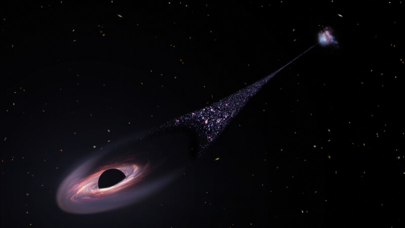 耶魯大學太空學家宣布發現一個巨大的黑洞正在太空中疾馳，留下長達20萬光年的新生恆星軌跡。圖為根據哈伯望遠鏡觀測結果繪製的黑洞。（圖取自NASA網頁nasa.gov）