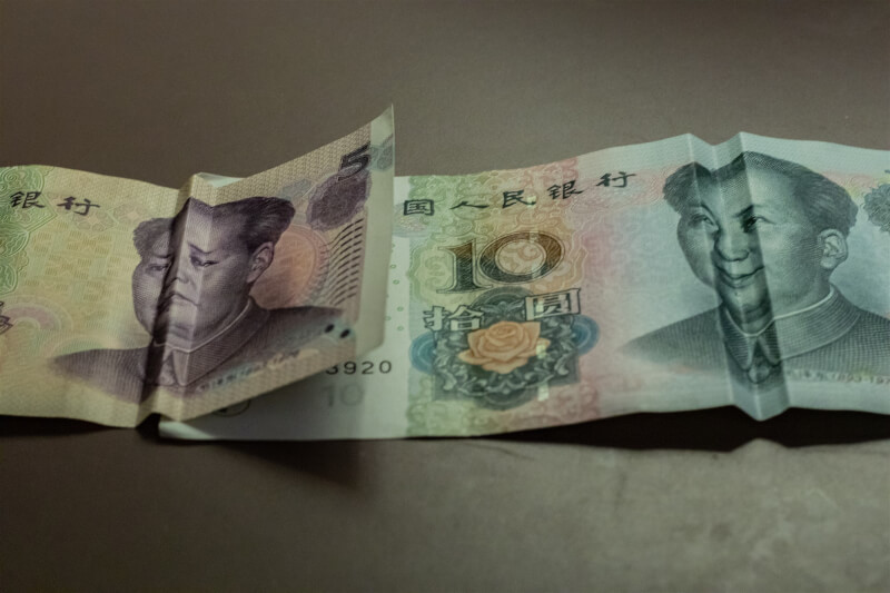 中國地方財政惡化。圖為人民幣。（圖取自Unsplash圖庫）