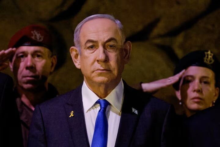 圖為以色列總理尼坦雅胡（中）6日在耶路撒冷出席大屠殺紀念日活動。（路透社）