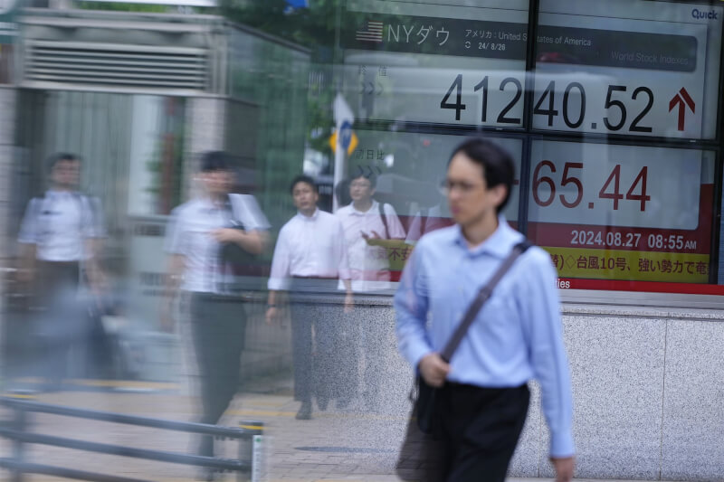 圖為日本東京上班族。（共同社）