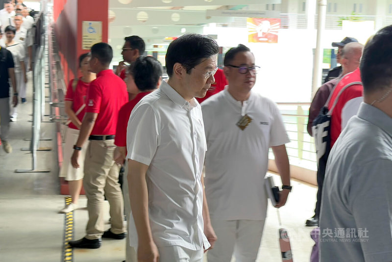 新加坡國會大選在即,總理黃循財(中)首次以人民行動黨秘書長身分,帶領出征全國大選。中央社記者吳昇鴻新加坡攝 114年4月23日