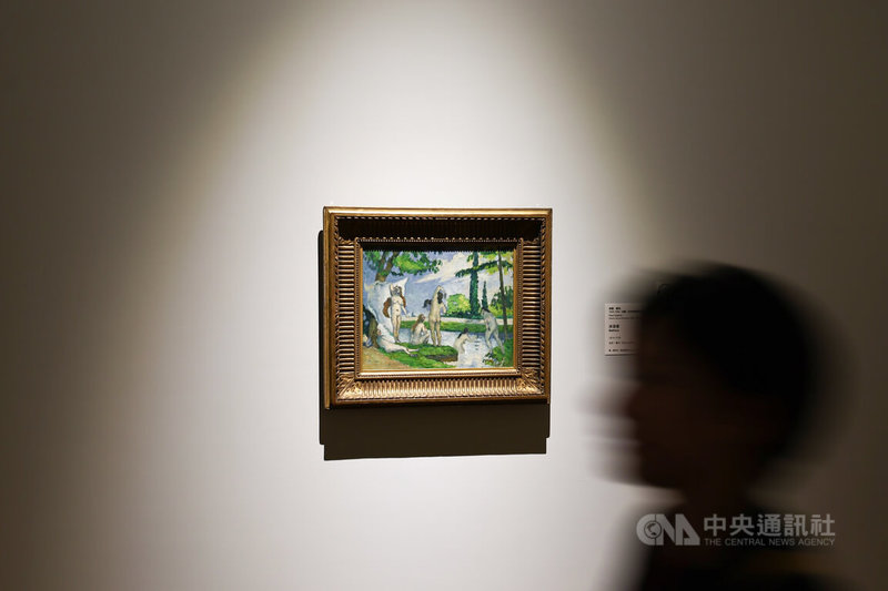 「從印象派到現代主義-美國大都會博物館名作展」14日起將在故宮第2展覽館展出,精選38名藝術家經典名作。圖為法國後印象派畫家保羅.塞尚作品「沐浴者」。中央社記者翁睿坤攝 114年6月13日