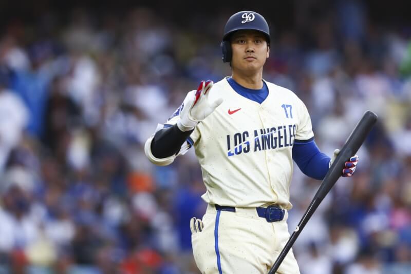 洛杉磯道奇日本球星大谷翔平14日對舊金山巨人擊出雙響砲,達成美國職棒大聯盟MLB生涯250轟里程碑。(美聯社)