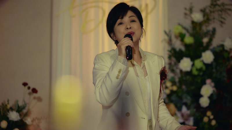 演員楊貴媚（圖）在電影「雙囍」中飾演事業有成，但控制欲極強的男方母親，她透露全片最難的就是歌唱戲，不只要唱好，還得在角色狀態內，當時拍攝時更遇上嚴重感冒，讓她感到十分挑戰。（水花電影提供）中央社記者洪素津傳真　114年12月25日