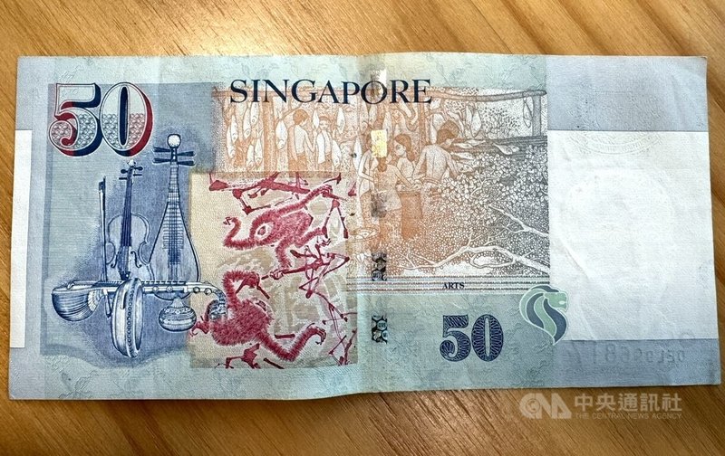 新加坡目前流通的50元人像系列鈔券呈現不同族群的樂器，象徵新加坡華、馬、印及西方文化的交融，也展現新加坡「花園城市」、象徵堅韌的國家精神。中央社記者吳昇鴻新加坡攝  115年1月27日