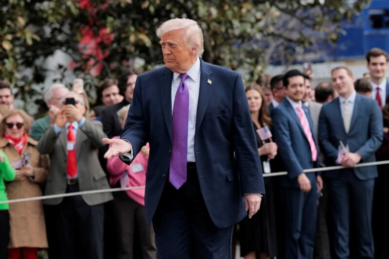 美國總統川普（中）。（路透社）