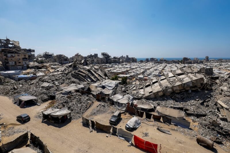 加薩市建築物因戰火受損。（路透社）