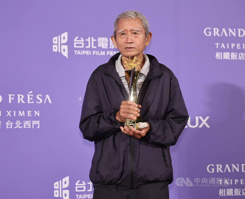 噴畫師李錫堅(圖)以電影「功夫」置景噴繪奪下傑出技術獎。中央社記者張新偉攝 115年7月12日