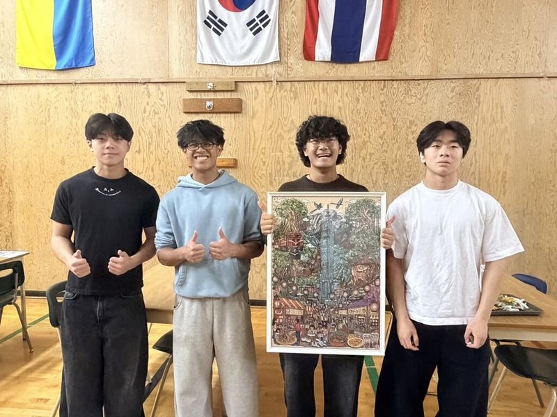 左起：黃威澄、Caine Ruiz、Dhundup Tsering、黃威寧，4名高中生一起享受台灣拼圖樂趣，都說很喜歡台灣的美食美景，希望未來有機會結伴一起去台灣玩。（Team Taiwan Club提供）中央社記者程愛芬溫哥華傳真　115年9月28日