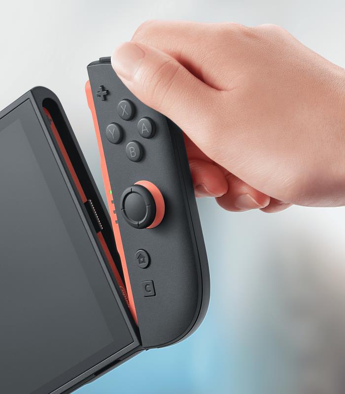 全新Joy-Con 2具磁吸式設計與穩定搖桿操控，外觀採淺紅、淺藍配色。
