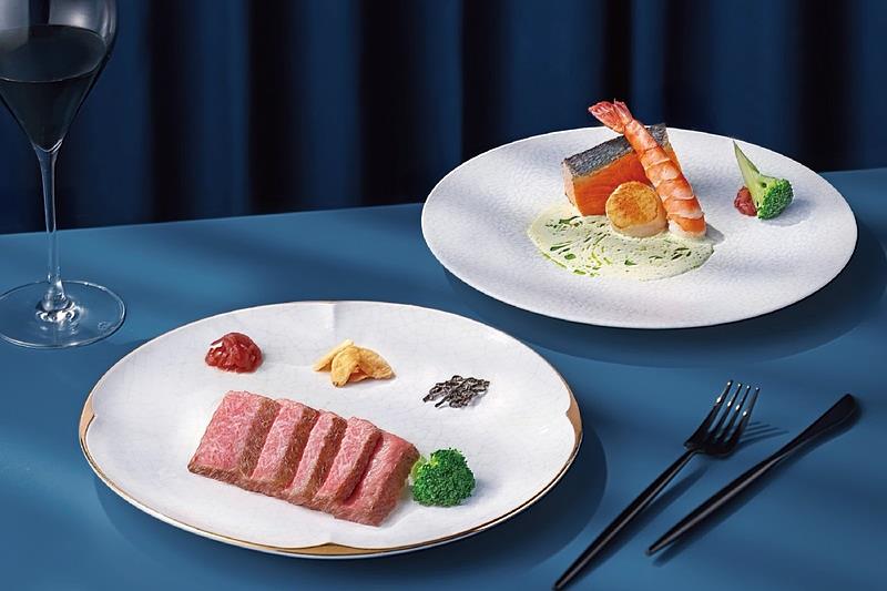 日本A5和牛饗宴,以鐵板高溫炙燒封存和牛油花,搭北海道干貝、海大蝦與鮭魚,海陸雙饗超享受。