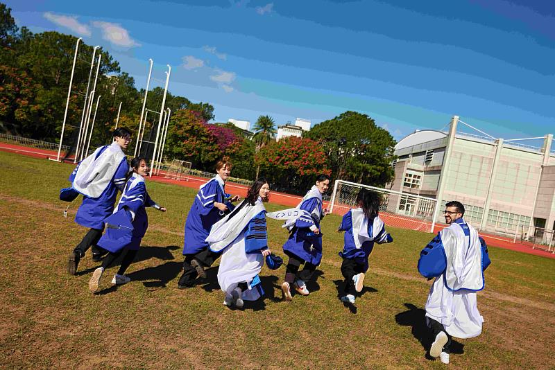 The design draws on the imagery of blue sky and white clouds, symbolizing exploration and forward flight, while subtle gear motifs on the stole and sleeves reflect innovation, continuity, and momentum toward future breakthroughs.