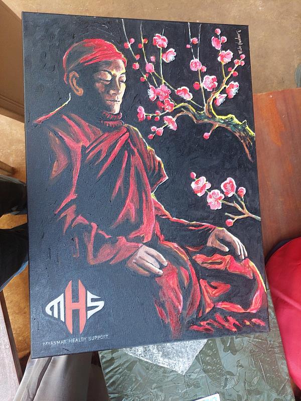 MHS特別獻上團隊成員親手繪製的心道法師水彩畫，表達對靈鷲山的感謝。（圖由靈鷲山慈善基金會提供）