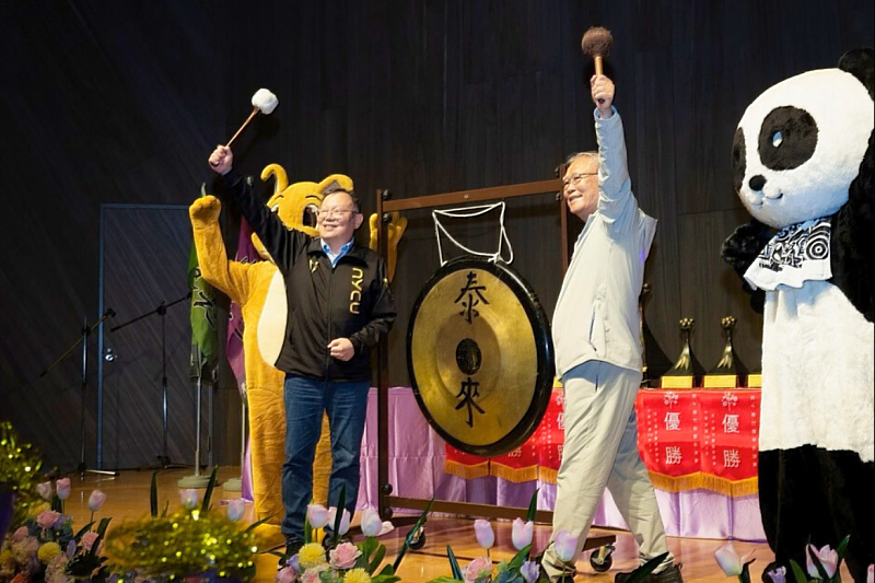 Following tradition, the Mei-Chu Games officially began with the ceremonial strike of the gong.