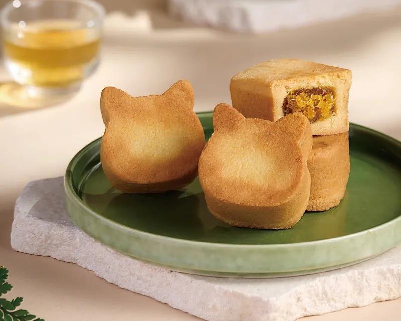 外型可愛的旺萊貓造型鳳梨酥，也承載了嘉義民雄的在地文化與風土，吸引日本消費者關注與選購。（資料來源：旺萊山）