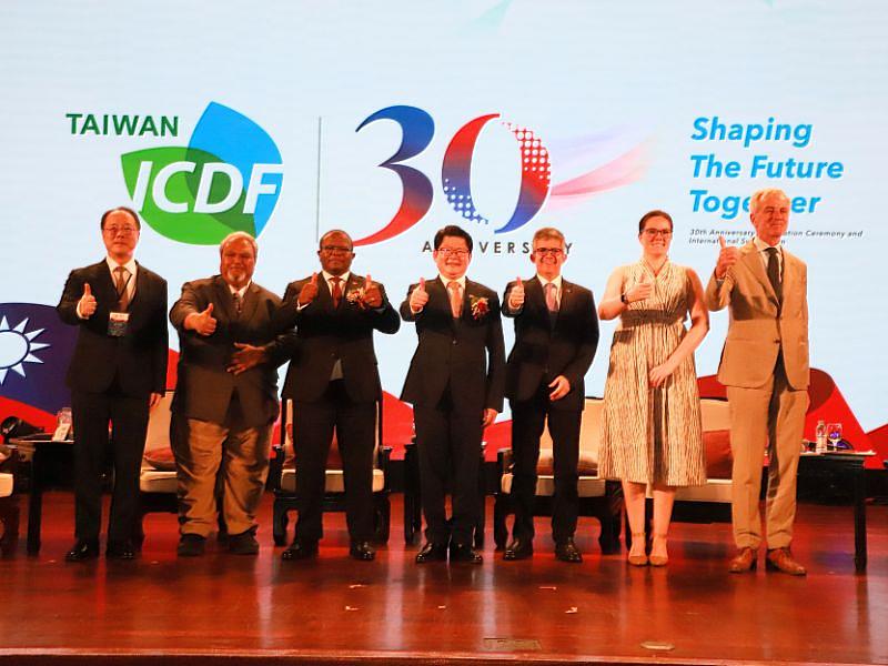 Group photo of the first panel discussion guests.