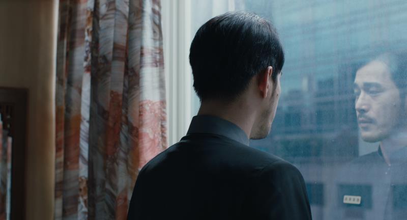 電影《安眠旅舍》劇照＿男主角黃騰浩。（圖/好威映象)
